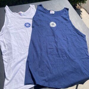 New, 100% Cotton Tank tops. One Navy and one White. X Large